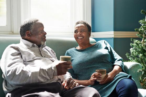 Senior couple relaxing on the couch together