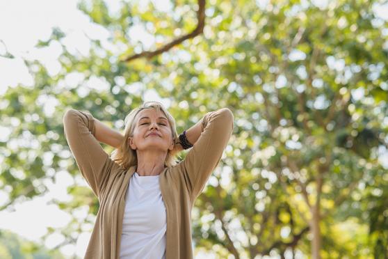 Woman breathing in the fresh air